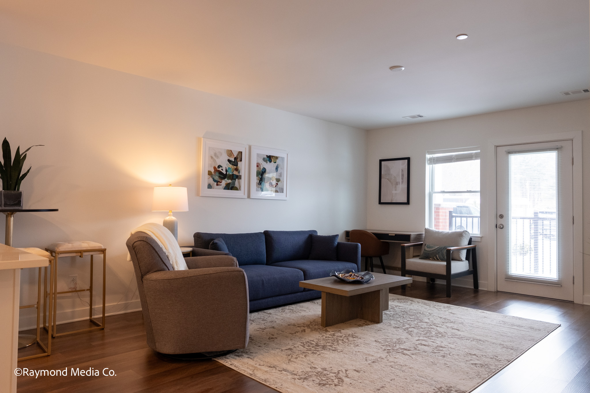 Bright apartment living room in Maine with natural window light